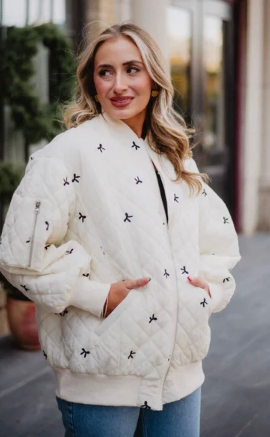 Katydid CREAM AND BLACK BOWS OVERSIZED QUILTED JACKET