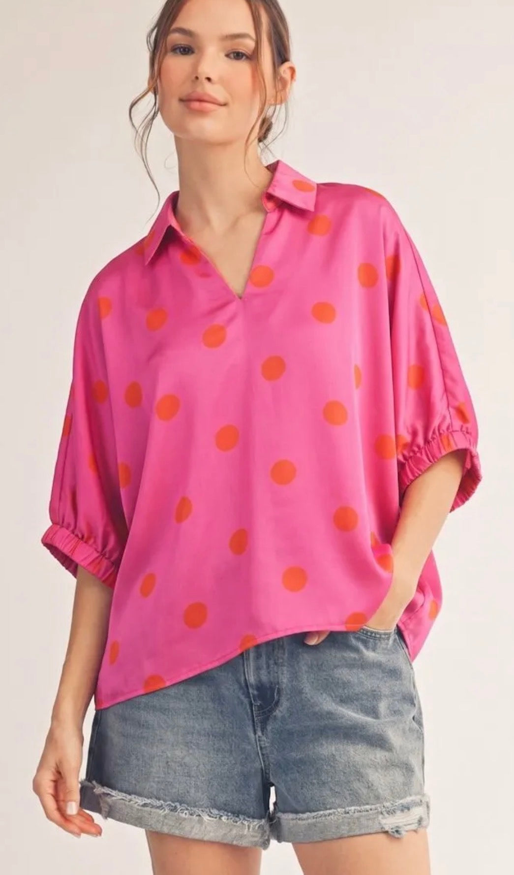 Jodifl Drop shoulder polka dot satin top with collared neckline.