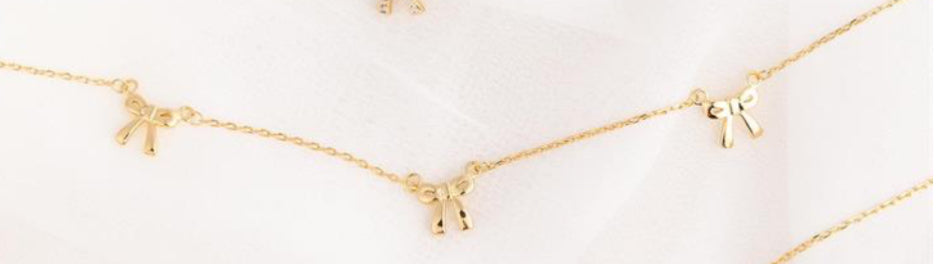 Michelle McDowell Holiday Bow Necklaces Gold