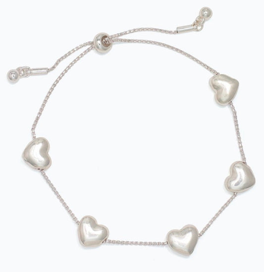 Periwinkle Stationed puffy silver hearts Bracelet