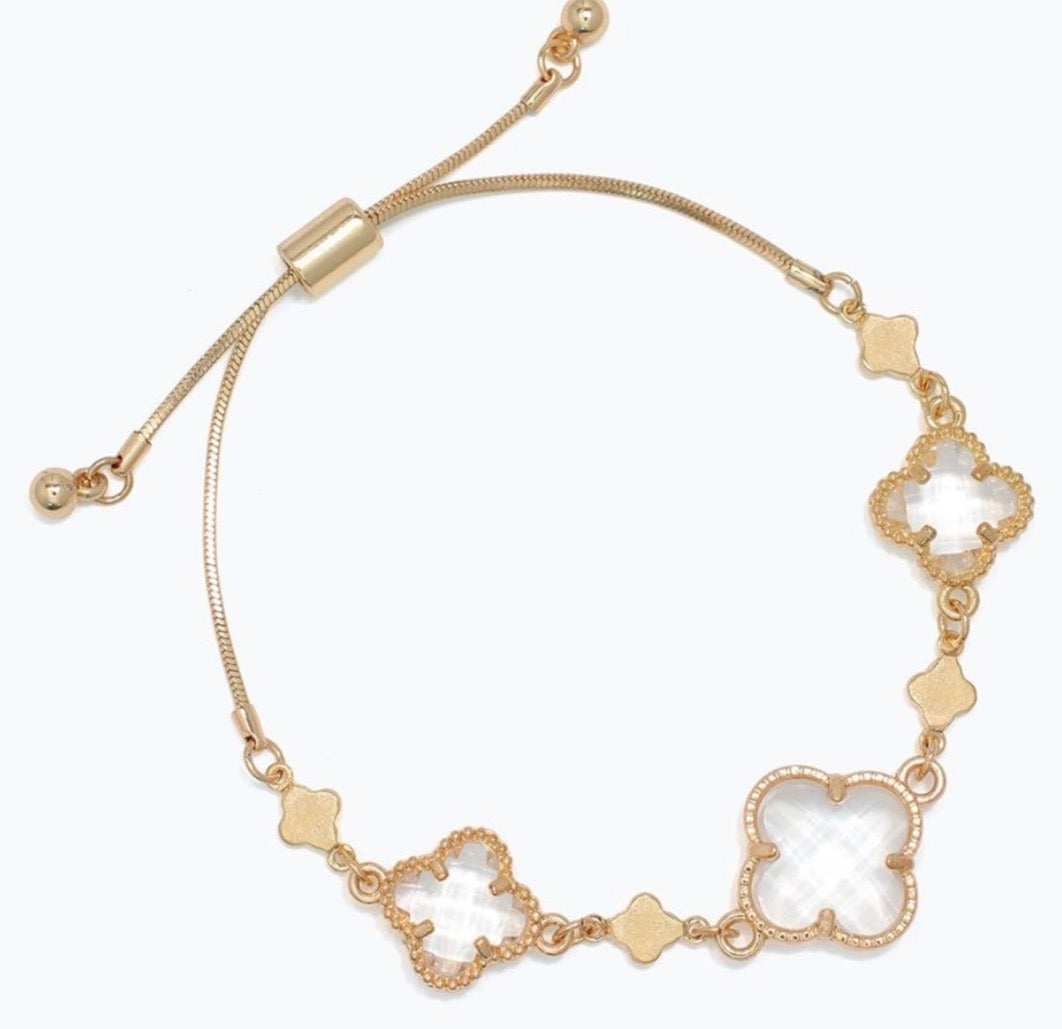 Periwinkle Gold clovers with faceted clear crystal